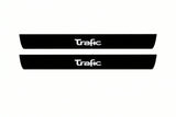 Catalogue illustration of two front black Matte PRO LED door sill plates with illuminated Trafic lettering for Renault Trafic Van X83; dimensions are selected during manufacture.