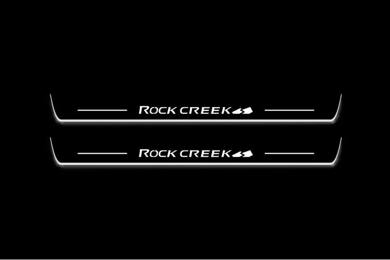 stainless steel door sill plates for Nissan Rogue III T33 2021+ with Rock Creek logo