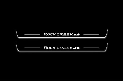 Nissan Rogue T33 2020–Present — Stainless Steel LED Door Sills — Rock Creek Logo