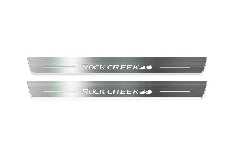 Nissan Rogue III T33 2021+ stainless steel LED door sill plates with Rock Creek logo