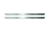 Two long silver-finished door sill plates with Rumble Bee lettering on a light background, straight-on view.