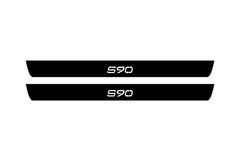 Catalog illustration of two black front door sill plates with S90 lettering.