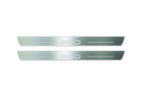 Two long silver-finished door sill plates with BYD lettering on a light background, straight-on view.