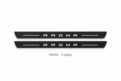 Seat Arona Matte PRO catalogue illustration: two flat black FRONT plates with illuminated ARONA lettering on white background