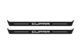 Matte PRO catalogue illustration showing two FRONT plates with illuminated Cupra lettering on a white background; Seat Leon III dimensions are selected during manufacture; rear plates are not pictured.