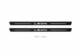 Seat Leon III Matte PRO catalogue illustration: two flat black FRONT plates with illuminated LEON lettering on white background