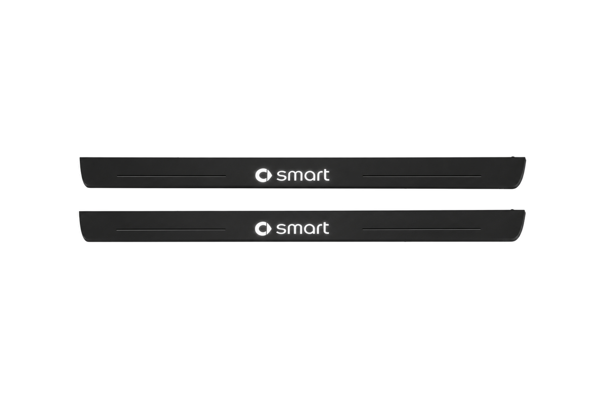 Matte PRO catalogue illustration showing two FRONT plates with illuminated Smart lettering on a white background; smart fortwo C453 dimensions are selected during manufacture; rear plates are not pictured.