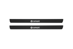Matte PRO catalogue illustration showing two FRONT plates with illuminated Smart lettering on a white background; smart fortwo C453 dimensions are selected during manufacture; rear plates are not pictured.