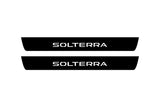 Subaru Solterra 2022+ stainless steel illuminated door sill protectors with Solterra logo