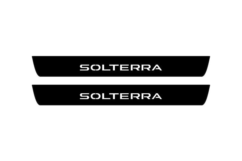 Subaru Solterra 2022+ stainless steel illuminated door sill protectors with Solterra logo