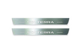 Two long silver-finished door sill plates with Solterra lettering on a light background, straight-on view.