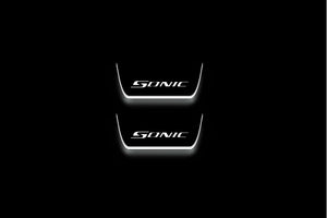 LED door sill plates Chevrolet Sonic 2012+ in stainless steel with Sonic logo