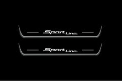 Two long door sill plates with Sport Line lettering and edges illuminated in white, straight-on view on a dark background.