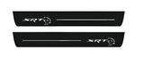 Catalog illustration of two long black door sill plates with offset white SRT lettering with Hellcat-head emblems and horizontal lines on a white background.