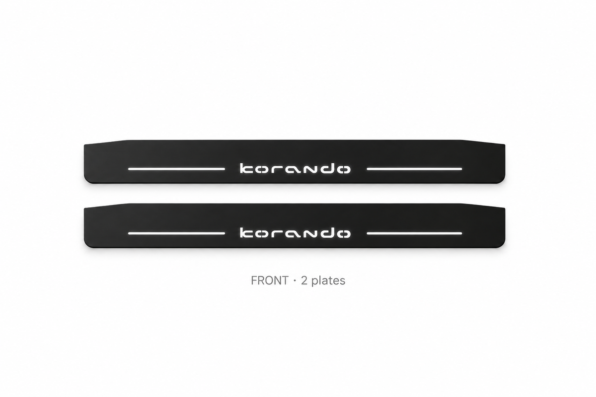 SsangYong Korando Matte PRO catalogue illustration: two flat black FRONT plates with illuminated stylized korando lettering on white