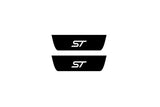 Ford Edge II 2014+ illuminated door sill protectors in matte black coated stainless steel with ST logo