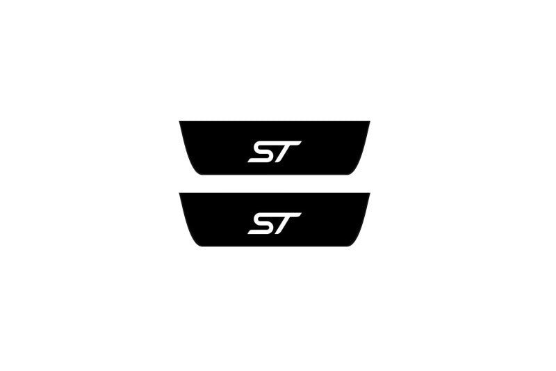Ford Edge II 2014+ illuminated door sill protectors in matte black coated stainless steel with ST logo