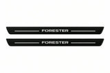 Catalogue illustration of two front black Matte PRO LED door sill plates with illuminated Forester lettering for Subaru Forester SK; dimensions are selected during manufacture.