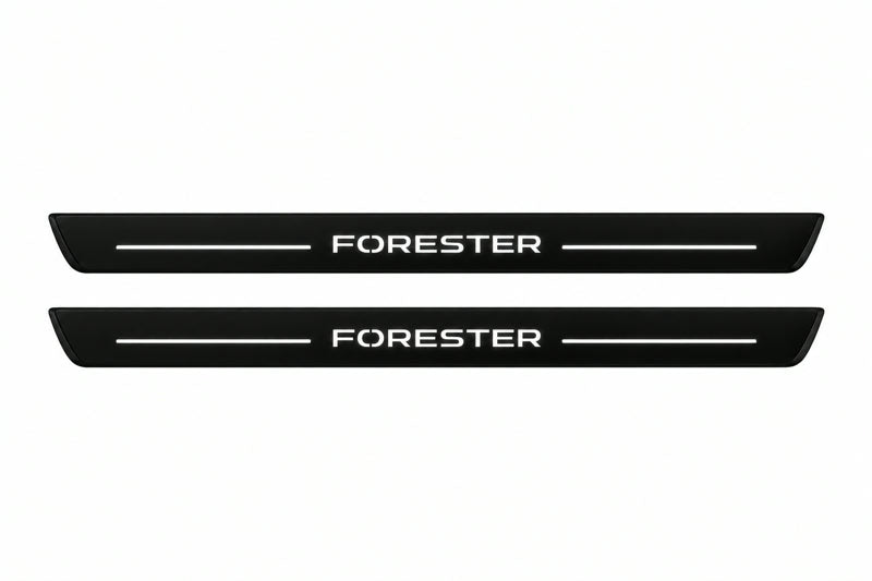 Catalogue illustration of two front black Matte PRO LED door sill plates with illuminated Forester lettering for Subaru Forester SK; dimensions are selected during manufacture.