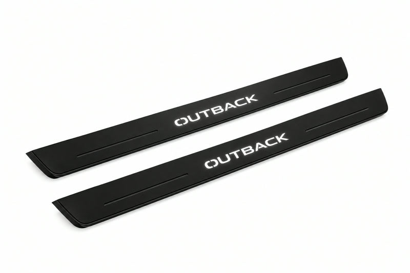 Catalogue illustration of two front black Matte PRO LED door sill plates with illuminated Outback lettering for Subaru Outback VI; dimensions are selected during manufacture.