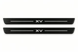 Catalogue illustration of two front black Matte PRO LED door sill plates with illuminated XV lettering for Subaru XV GP; dimensions are selected during manufacture.