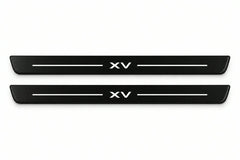 Catalogue illustration of two front black Matte PRO LED door sill plates with illuminated XV lettering for Subaru XV GP; dimensions are selected during manufacture.