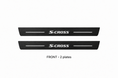 Suzuki S-Cross II Matte PRO catalogue illustration: two black FRONT plates with illuminated S.CROSS lettering on white