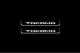 LED door sill plates Toyota Tacoma IV 2024+ in stainless steel with Tacoma logo
