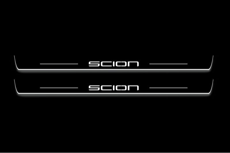 Scion tC I 2004+ stainless steel illuminated entry guards with Scion logo