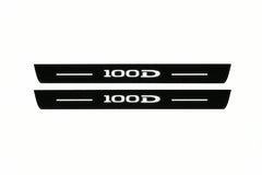 Catalogue illustration of two front black Matte PRO LED door sill plates with illuminated 100D lettering for Tesla Model S; dimensions are selected during manufacture.