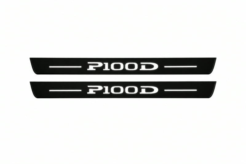 Catalogue illustration of two front black Matte PRO LED door sill plates with illuminated P100D lettering for Tesla Model S; dimensions are selected during manufacture.