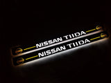 LED door sill plates Nissan Tiida 2004+ in stainless steel with TIIDA logo