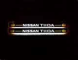 Nissan Tiida 2004+ LED door sill plates in stainless steel with TIIDA logo