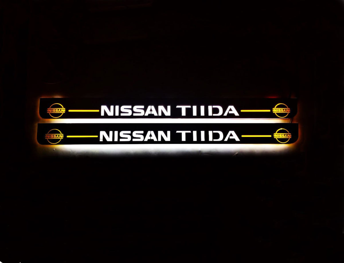 Nissan Tiida 2004+ LED door sill plates in stainless steel with TIIDA logo