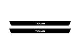 Volkswagen Tiguan II 2016+ matte black coated stainless steel illuminated entry guards with Tiguan logo