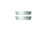 Two short silver-finished door sill plates with Tiggo lettering on a light background, straight-on view.