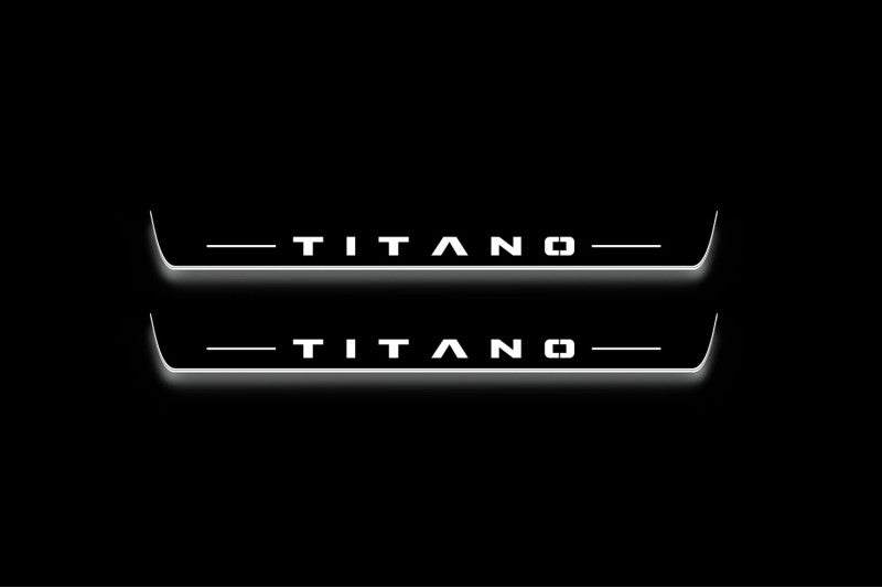 Two long door sill plates with Titano lettering and edges illuminated in white, straight-on view on a dark background.