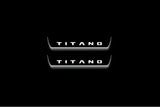 Two short door sill plates with Titano lettering and edges illuminated in white, straight-on view on a dark background.