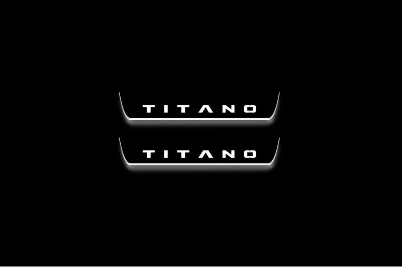 Two short door sill plates with Titano lettering and edges illuminated in white, straight-on view on a dark background.
