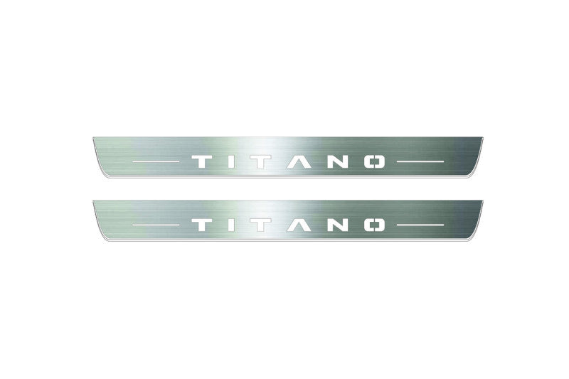 Two long silver-finished door sill plates with Titano lettering on a light background, straight-on view.