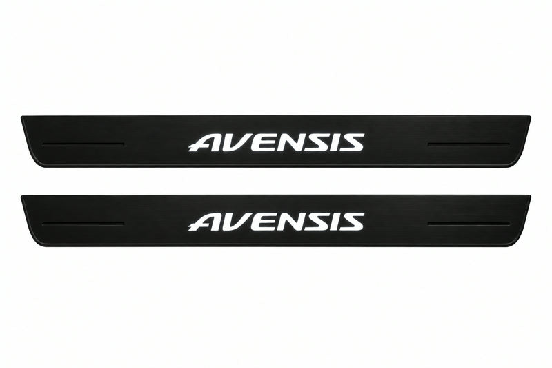 Catalogue illustration of two front black Matte PRO LED door sill plates with illuminated Avensis lettering for Toyota Avensis Wagon T270; dimensions are selected during manufacture.