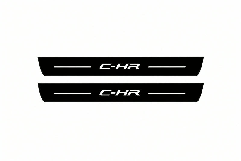 Catalogue illustration of two front black Matte PRO LED door sill plates with illuminated C-HR lettering for Toyota C-HR I; dimensions are selected during manufacture.