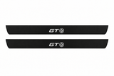 Catalogue illustration of two black Matte PRO front door sill plates with illuminated GT86 lettering on top. The edges remain unlit. No rear plates are shown; final dimensions are chosen for the GT86 Coupe ZN6 during manufacture.