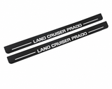Toyota Land Cruiser Prado J120 Land Cruiser Prado Type 2 Matte PRO LED door sills, FRONT two-piece catalogue illustration, matte black with white illumination