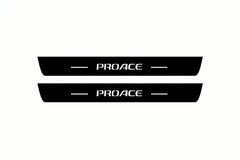 Catalogue illustration of two front black Matte PRO LED door sill plates with illuminated ProAce lettering for Toyota ProAce Van K0; dimensions are selected during manufacture.