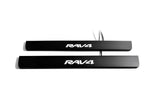Two black door sill plates with white Rav4 lettering and visible wiring on a light background.