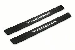 Catalogue illustration of two front black Matte PRO LED door sill plates with illuminated Tacoma lettering for Toyota Tacoma N300; dimensions are selected during manufacture.