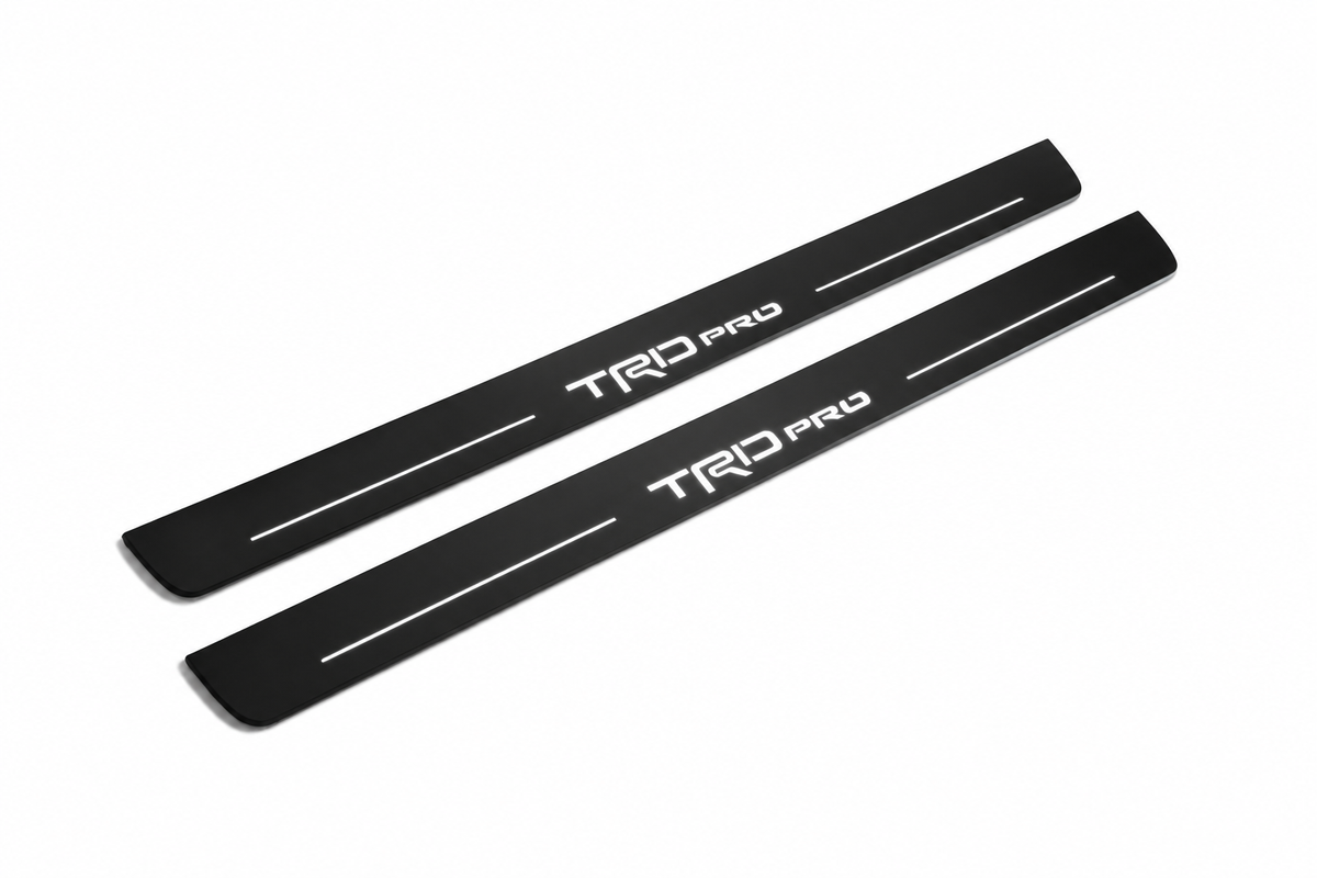 Toyota Tundra CrewMax XK50 TRD Pro Matte PRO LED door sills, FRONT two-piece catalogue illustration, matte black with white illumination