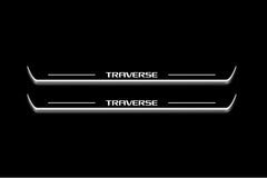 Two long door sill plates with Traverse lettering and edges illuminated in white, straight-on view on a dark background.