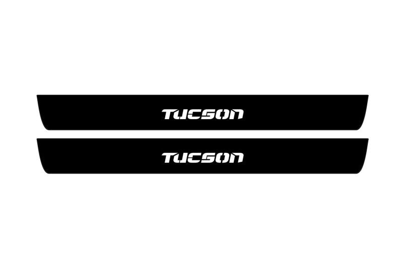 Hyundai Tucson I 2004+ illuminated entry guards in stainless steel with Tucson logo
